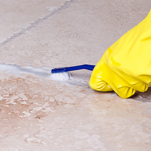 How to clean tile grout Brushing Grout
