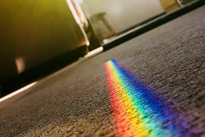 Color rainbow on gray carpet